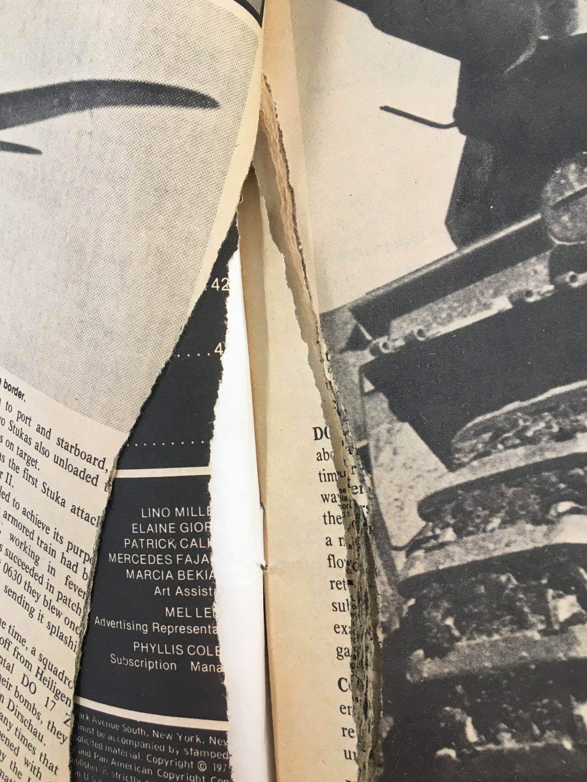 Detailed view of a damaged page in the VTG True War Magazine from March 1976, showcasing U.S. Airborne Assaults with historical black and white photographs.