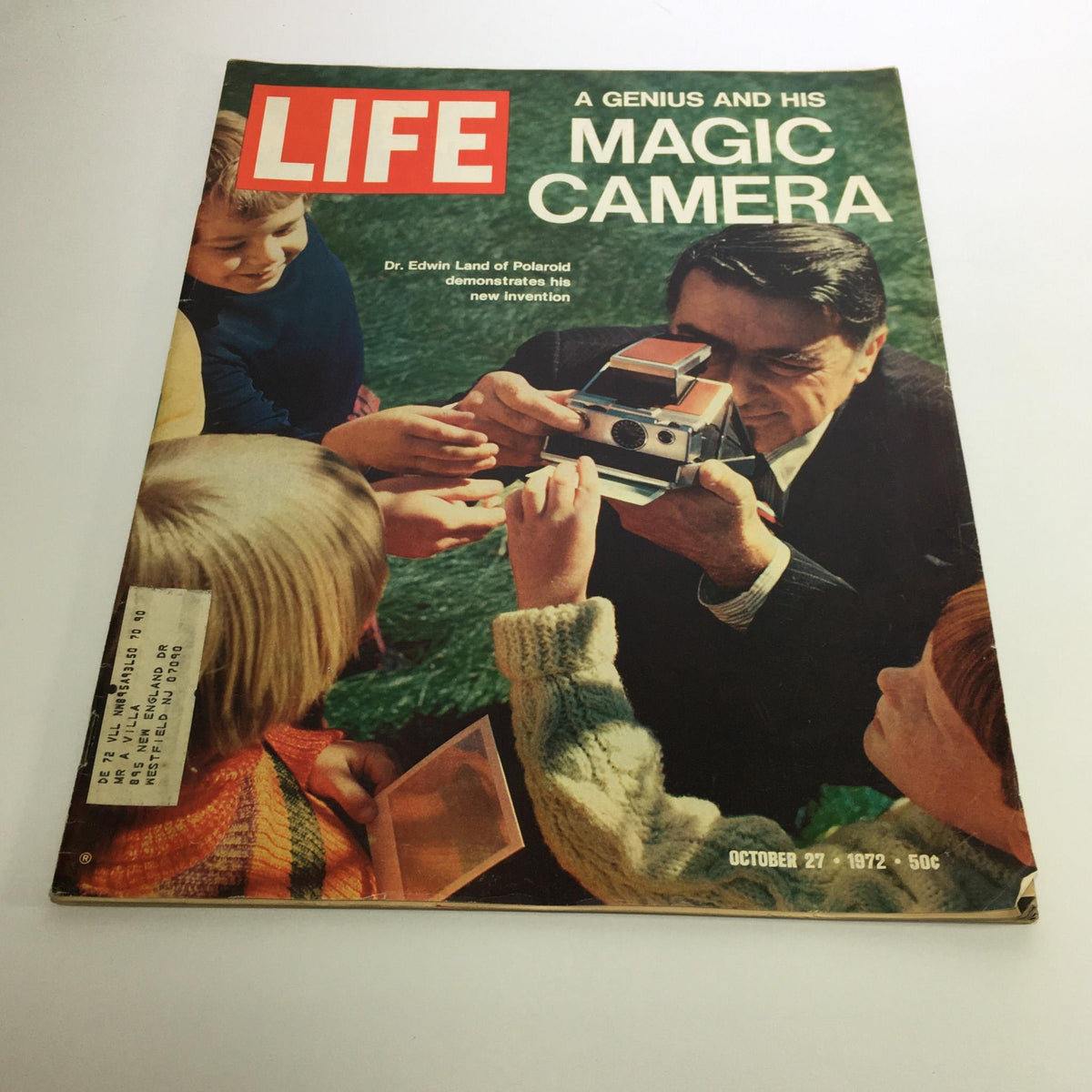 Cover of Life Magazine dated October 27, 1972, featuring the title 'A Genius and His Magic Camera'. The image shows Dr. Edwin Land of Polaroid demonstrating his camera to a group of children, capturing the essence of photography innovation in the early 1970s.