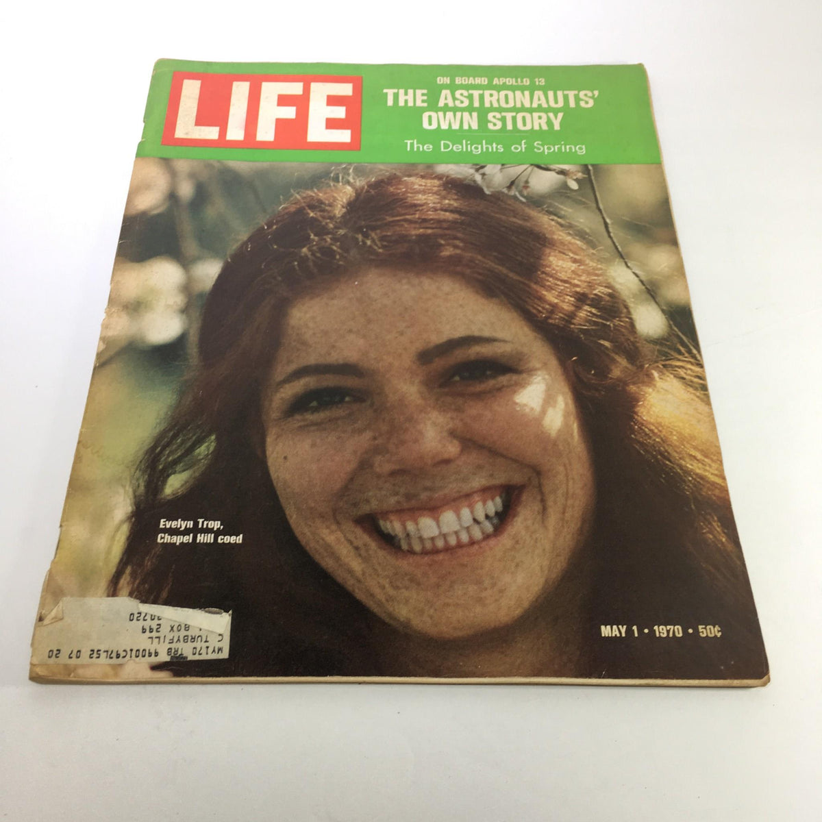 Cover of Life Magazine, May 1, 1970, featuring the title 'On Board Apollo 13: The Astronauts' Own Story' with a smiling woman, Evelyn Trop, highlighted. This issue captures significant moments from NASA's Apollo 13 mission.