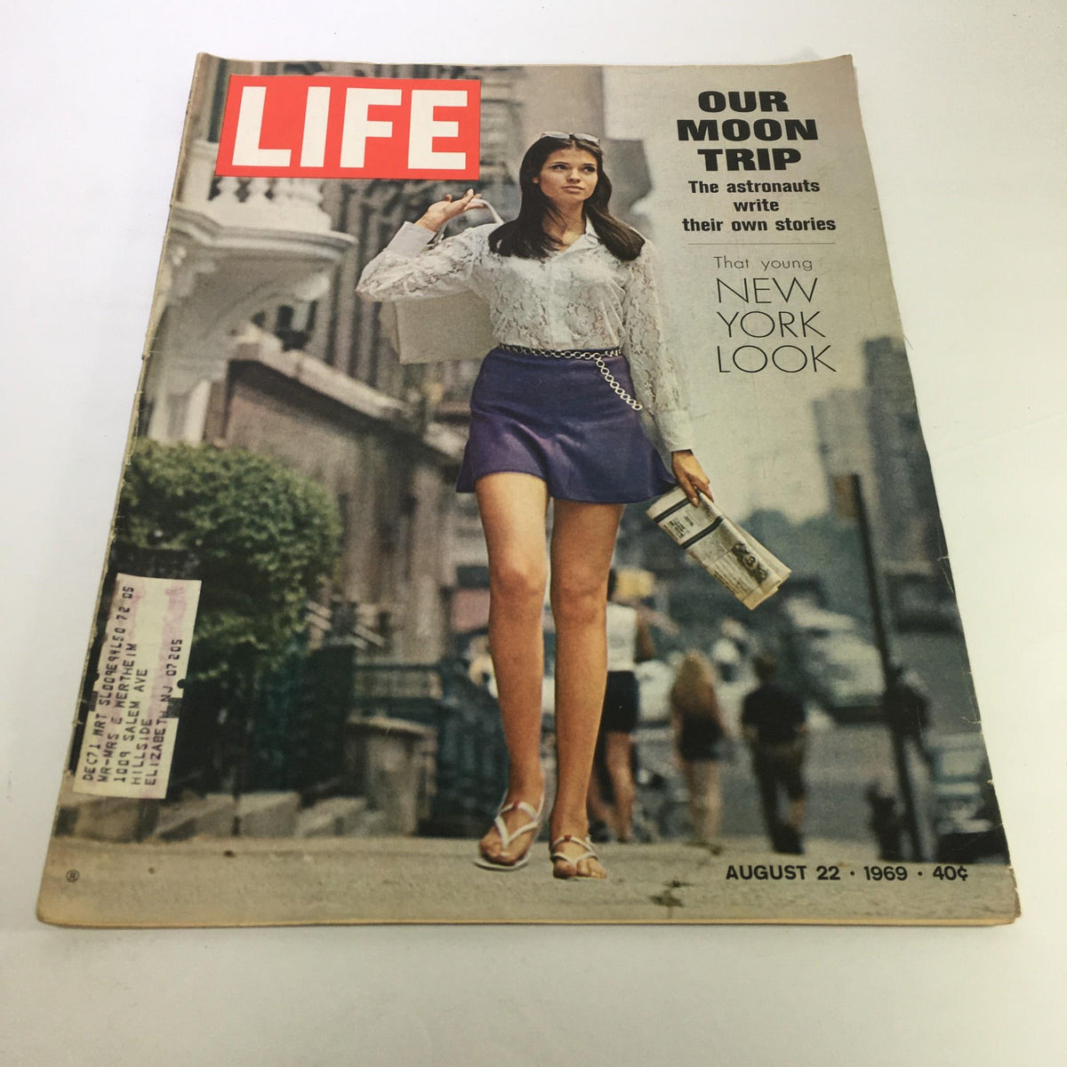 Cover of Life Magazine: August 22, 1969 featuring the title 'Our Moon Trip' along with 'That Young New York Look', showcasing a young woman in a trendy outfit walking on a city street.
