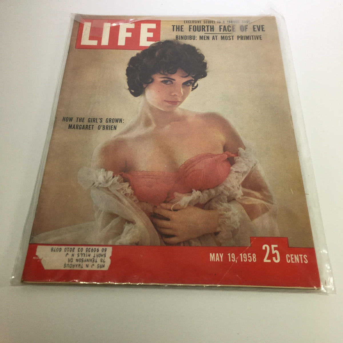 Vintage Life Magazine cover from May 19, 1958, featuring the article 'How The Girl's Grown: Margaret O'Brien'. The cover showcases a young woman with curly black hair in a light pink outfit, surrounded by historical context reflective of the late 1950s. This collectible magazine is a valuable piece for enthusiasts of vintage publications.