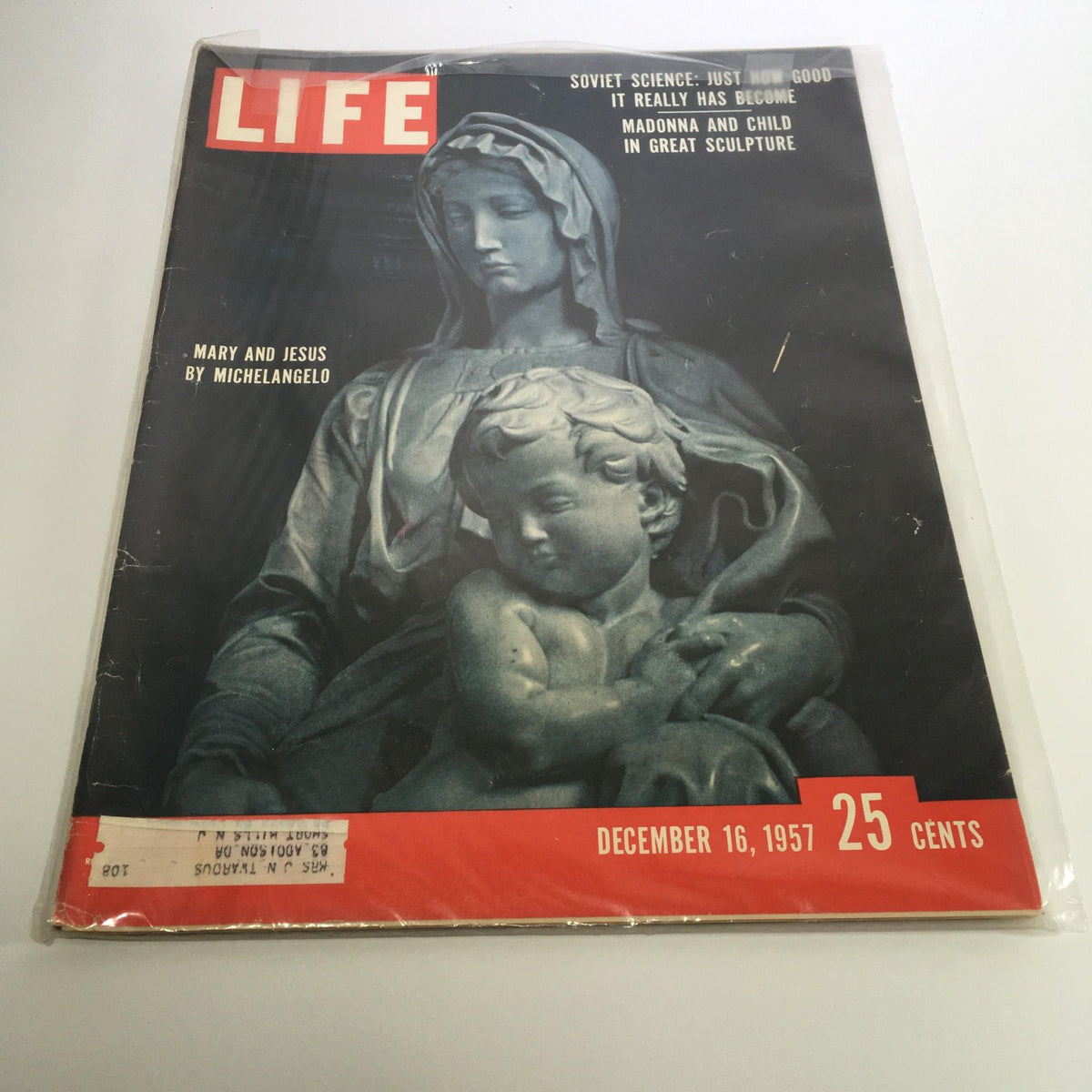 Cover of Life Magazine from December 16, 1957 featuring the title 'Madonna and Child in Great Sculpture'. The image depicts a beautiful sculpture of Mary and Jesus, highlighting its intricate details and artistic significance.