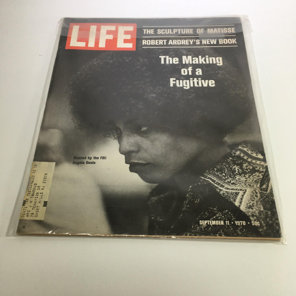 Cover of Life Magazine dated September 11, 1970, featuring the headline 'The Making of a Fugitive: Angela Davis,' with a portrait of Angela Davis. The magazine showcases significant social activism themes and reflections from the 1970s era.