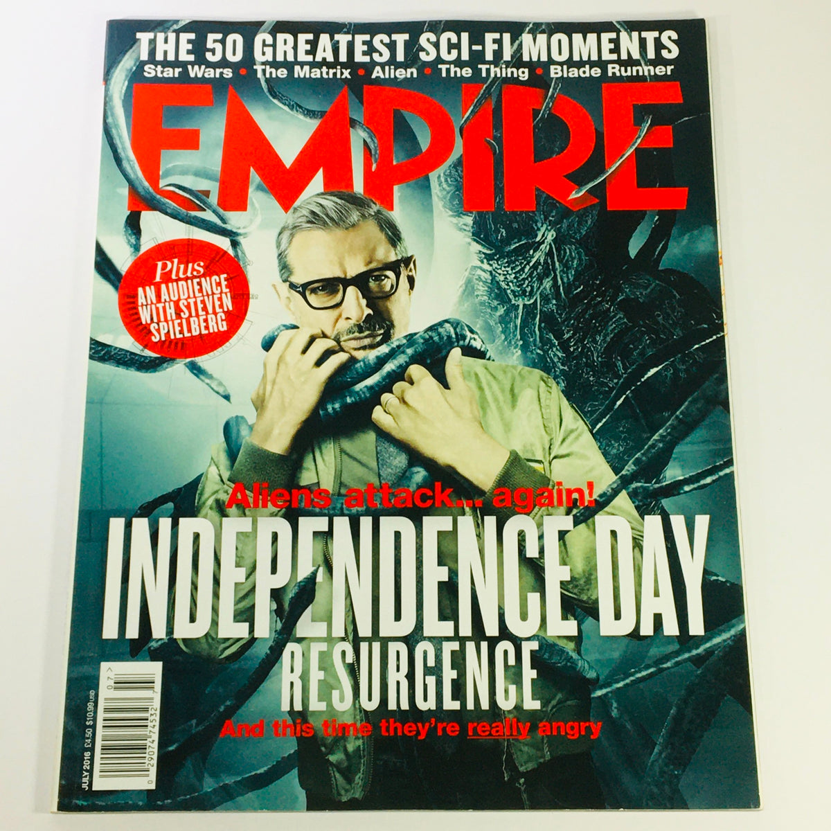 Empire Magazine July 2016 cover featuring Jeff Goldblum, highlighting the movie Independence Day Resurgence, with a dramatic design and sci-fi theme.