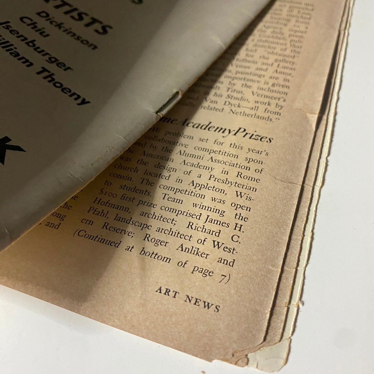 Close-up view of the contents page of VTG Art News Magazine March 14, 1943, showing wear and tear typical for vintage publications, focusing on artist prizes and exhibition information.