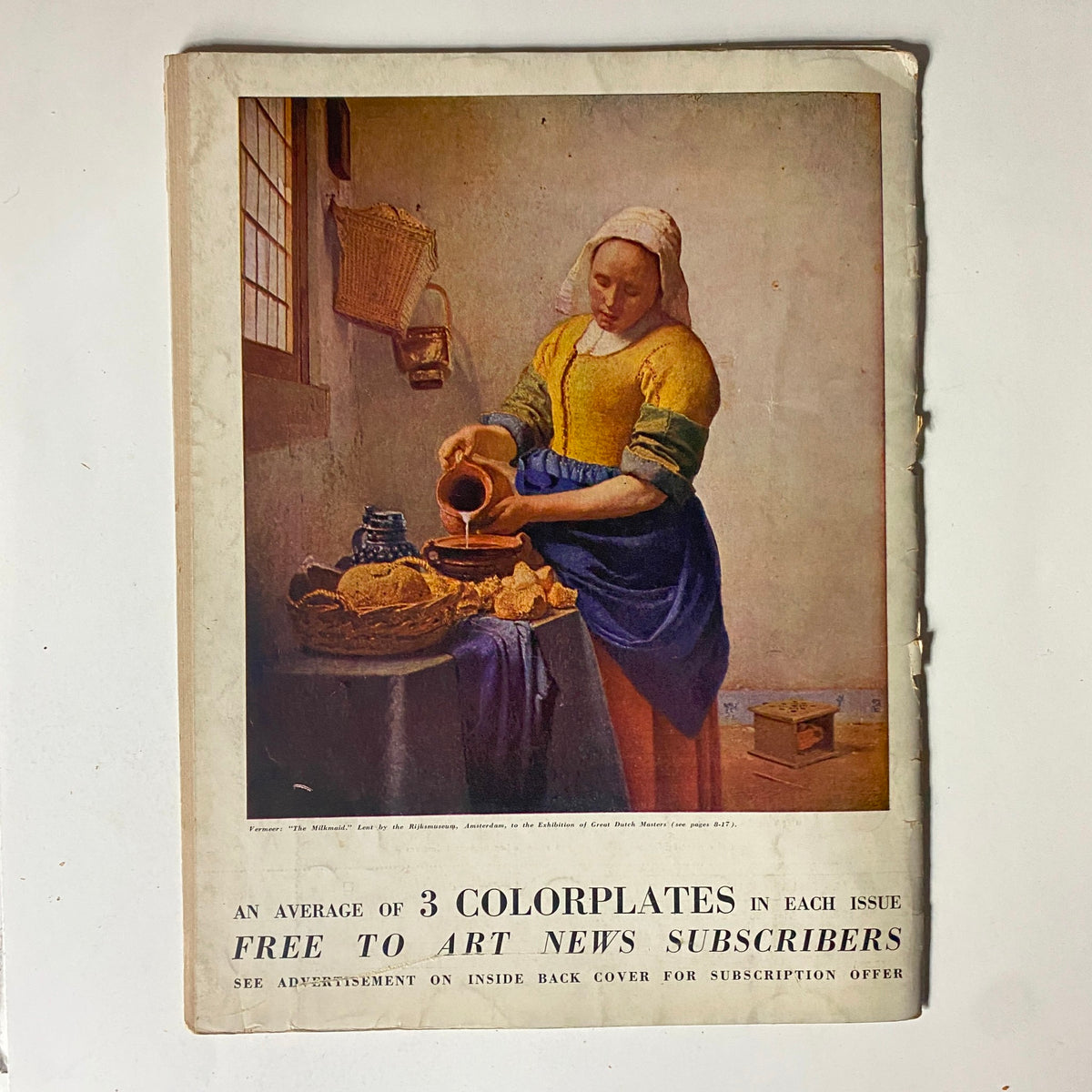 Cover image of VTG Art News Magazine October 15, 1942, showcasing a colorful artwork titled 'The Milkmaid' by Johannes Vermeer, framed within the context of the exhibition 'Great Dutch Masters'.