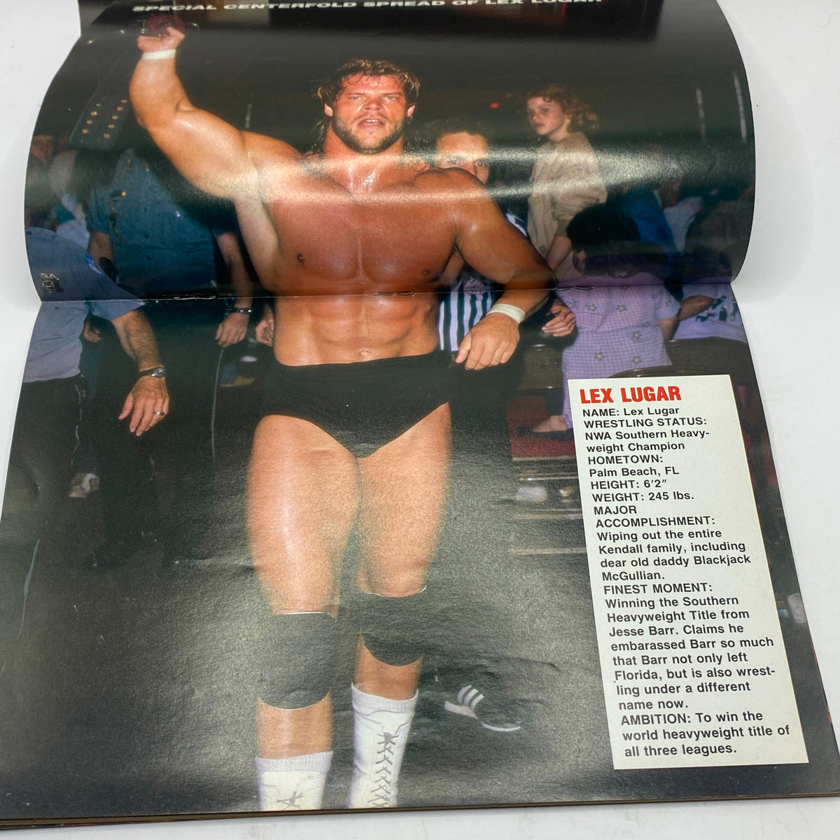 Inside spread of Wrestling Fury Magazine December 1986 featuring a special centerfold of Lex Luger, a prominent wrestler of the time, with his statistics and accomplishments.