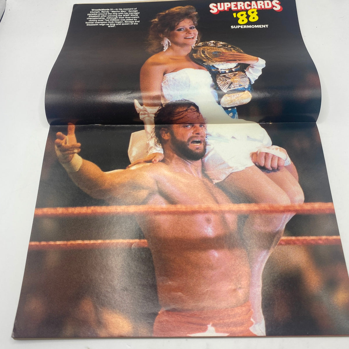 Pro Wrestling Illustrated September 1988 magazine featuring Randy Savage celebrating in the ring, holding a championship belt while a woman in a white dress sits on his shoulders, capturing the excitement of wrestling history.
