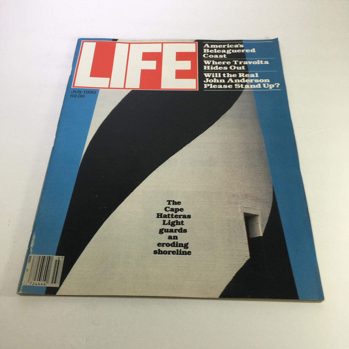 Cover of Life Magazine from July 1980 featuring the Cape Hatteras Light, highlighting environmental themes related to coastal erosion and conservation, with the caption: 'The Cape Hatteras Light guards an eroding shoreline.'