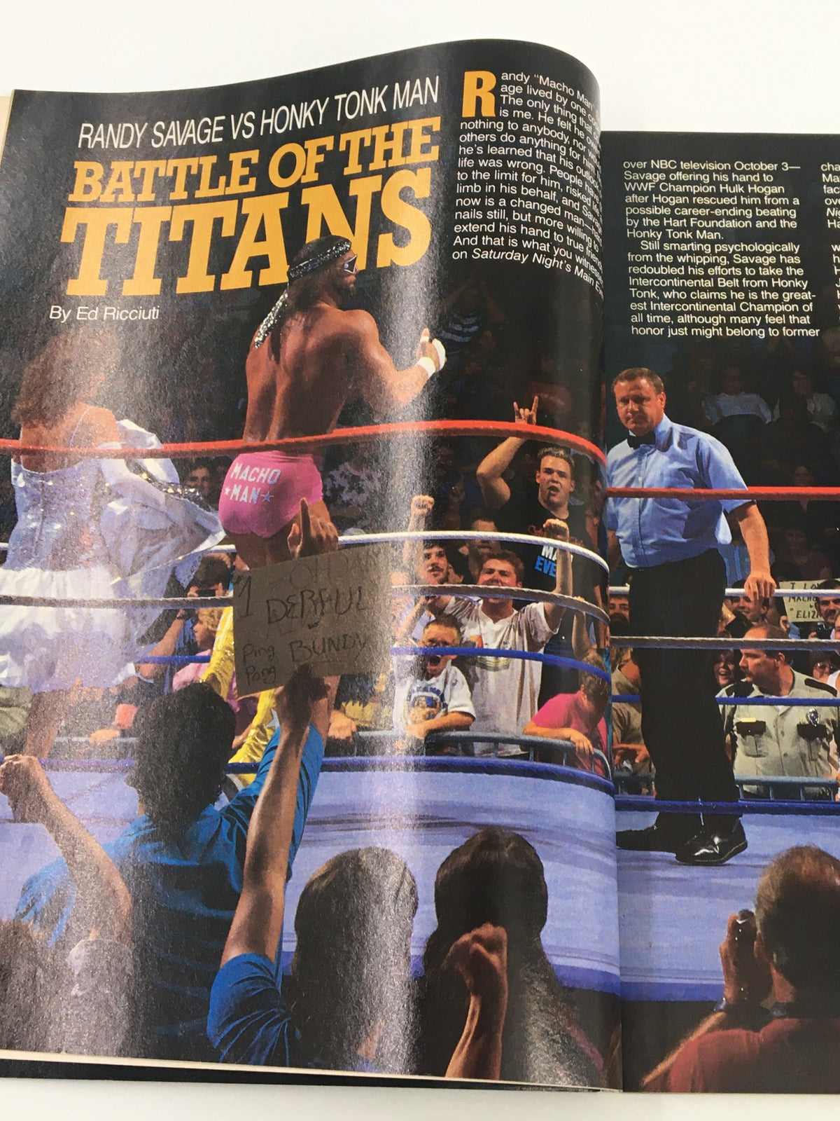 Article page from VTG WWF Magazine December 1987 titled 'Battle of the Titans', featuring Randy Savage facing Honky Tonk Man in the ring.