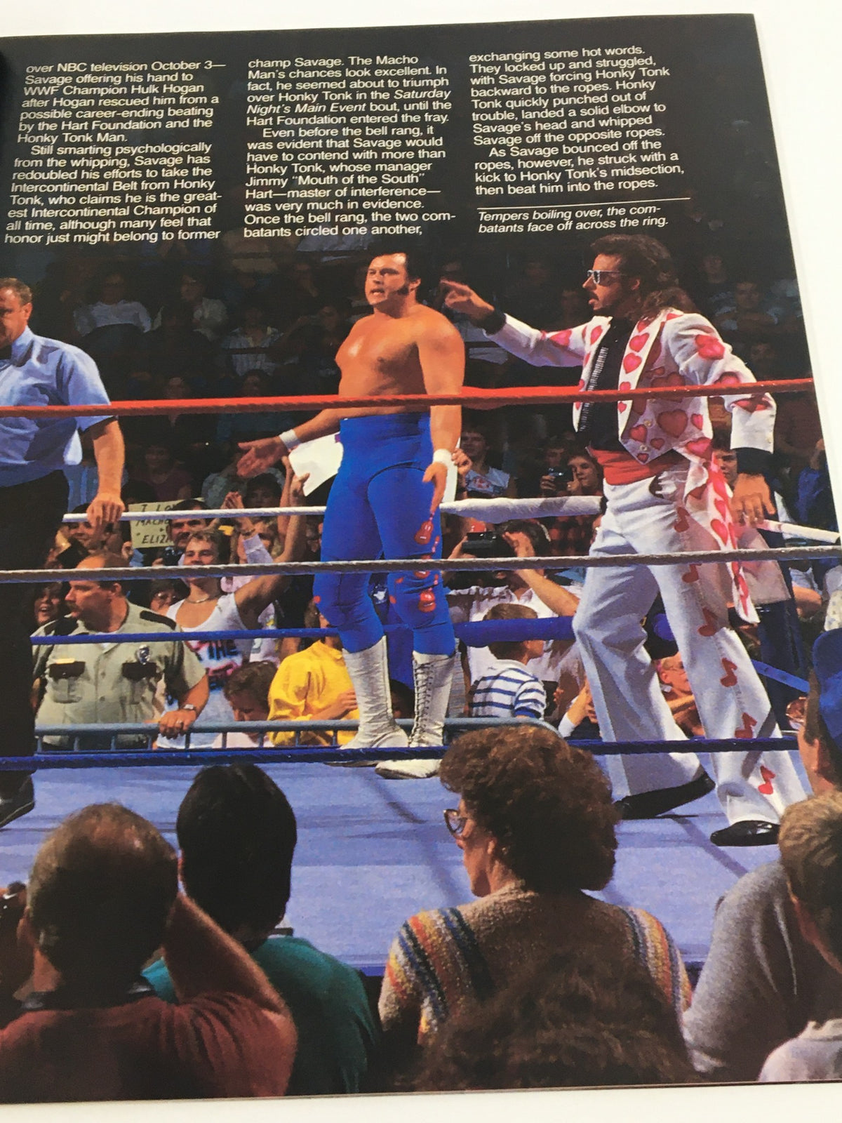 Another article page from VTG WWF Magazine December 1987 showcasing Randy Savage in the ring during his match against Honky Tonk Man with a dramatic crowd scene.