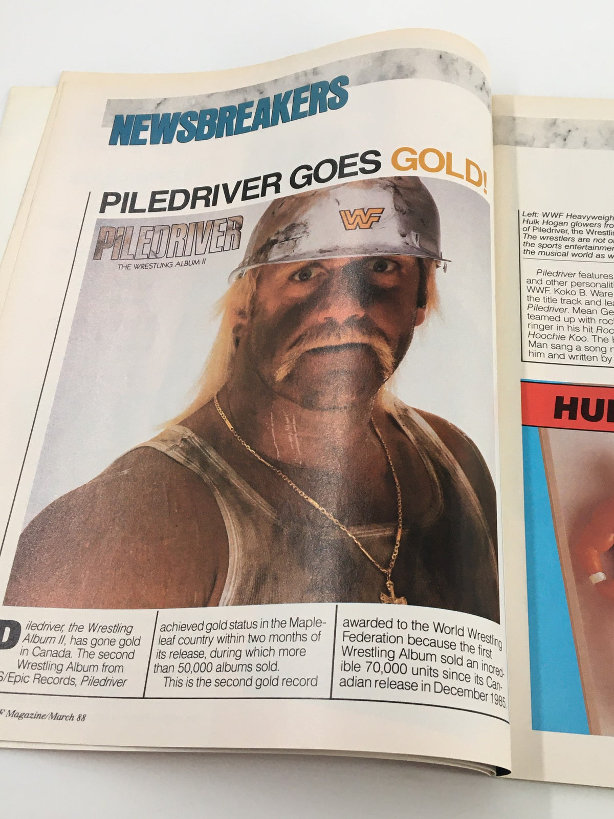 Page from WWF Magazine July 1988 featuring a breaking news article titled 'Piledriver Goes GOLD!' highlighting Hulk Hogan and celebrating Piledriver, the wrestling album II, which achieved gold status.