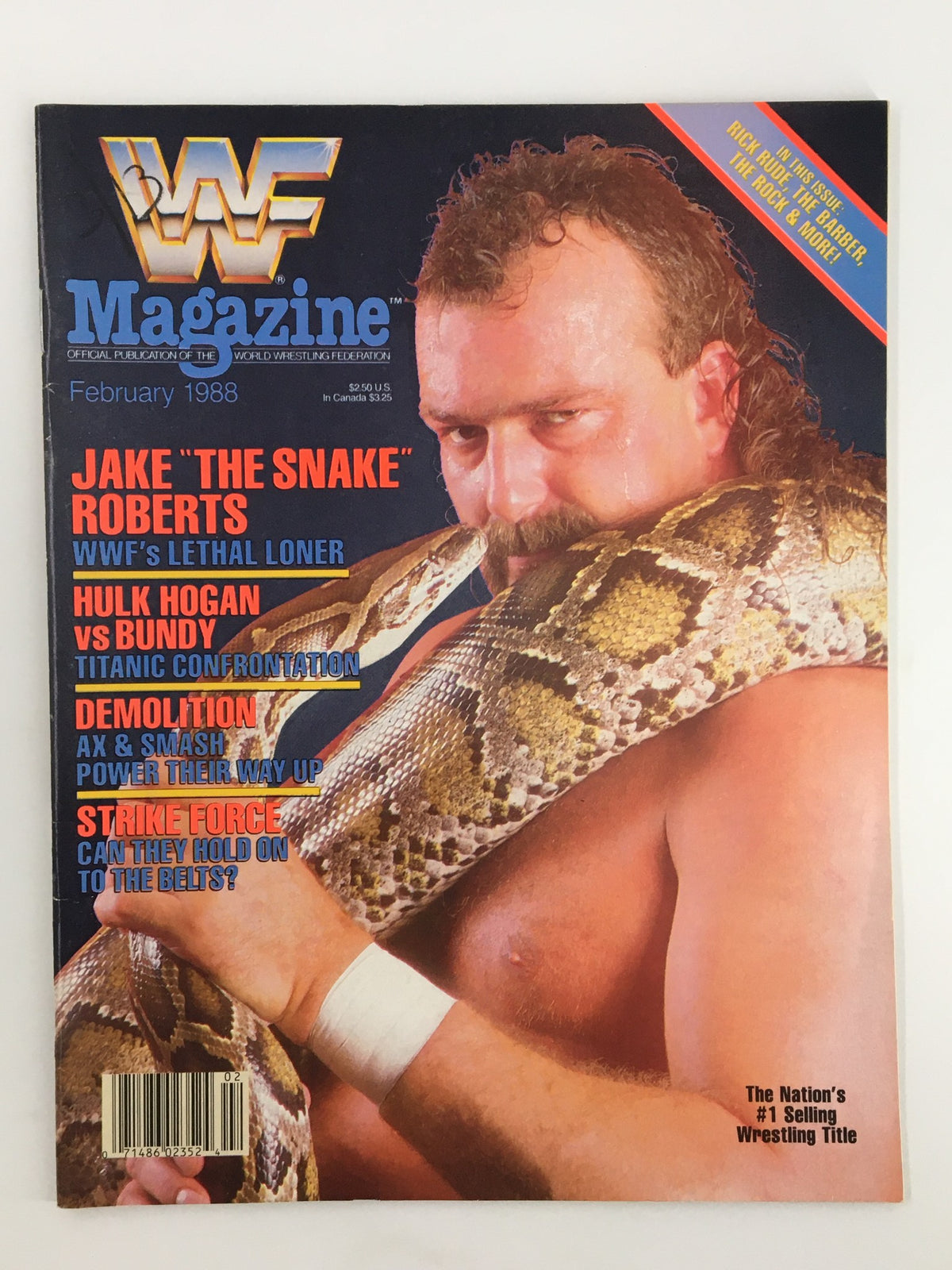 Cover of the VTG WWF Magazine February 1988 featuring Jake "The Snake" Roberts with a snake, and highlights of Hulk Hogan vs. King Kong Bundy.