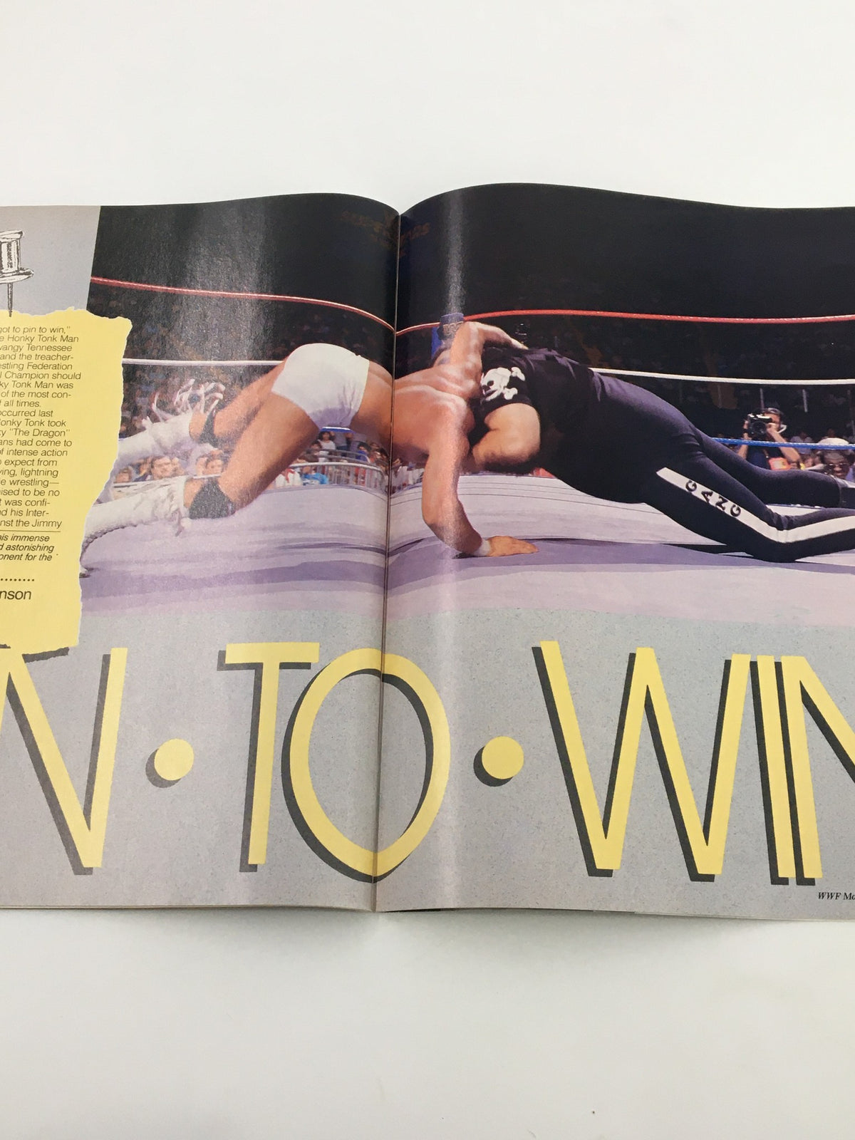 An action scene from a wrestling match featured in VTG WWF Magazine January 1988, showcasing wrestling techniques.