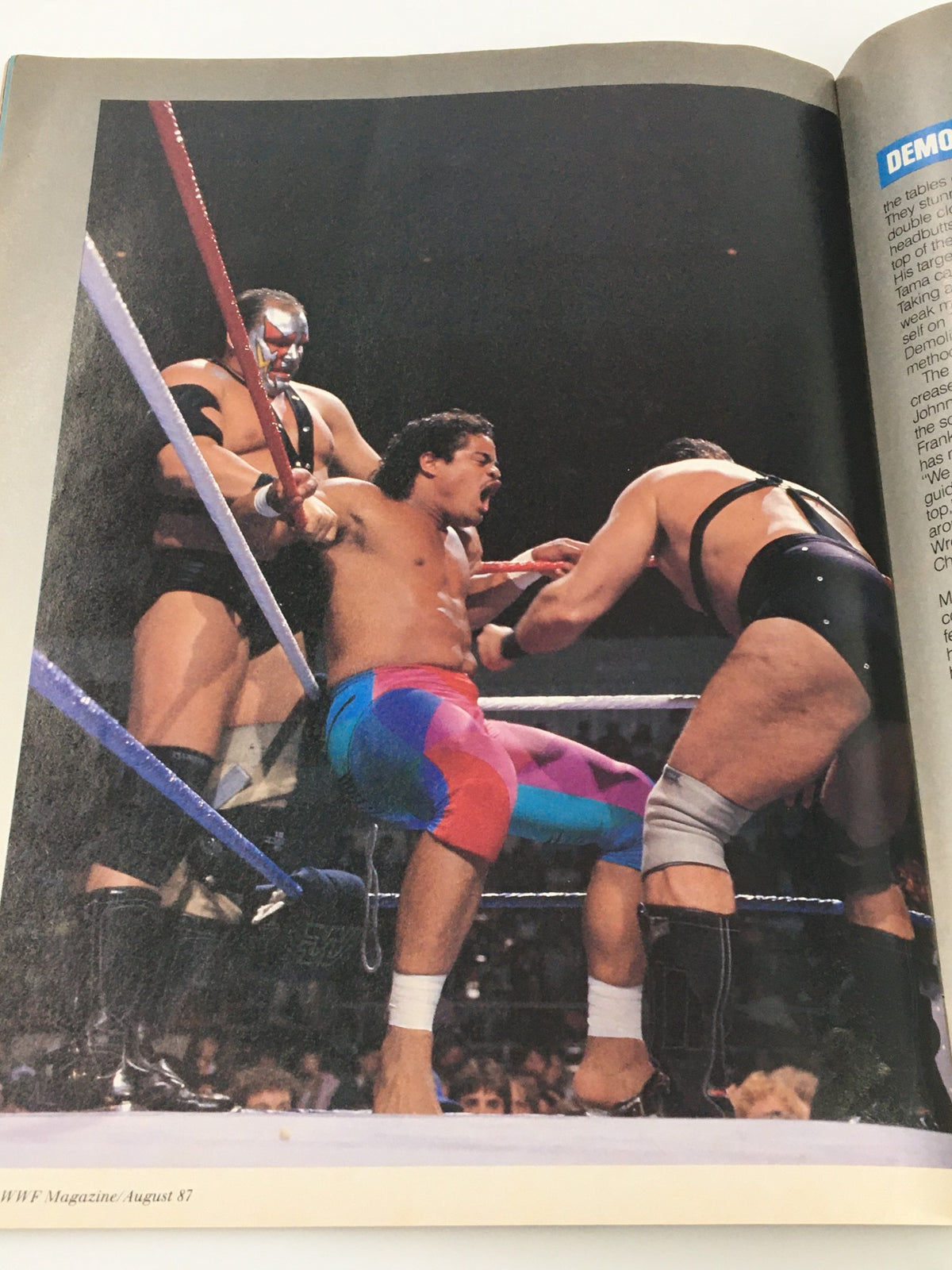 WWF Magazine August 1987 depicting a wrestling scene with an intense match involving two wrestlers, highlighting the dramatic dynamics of professional wrestling.