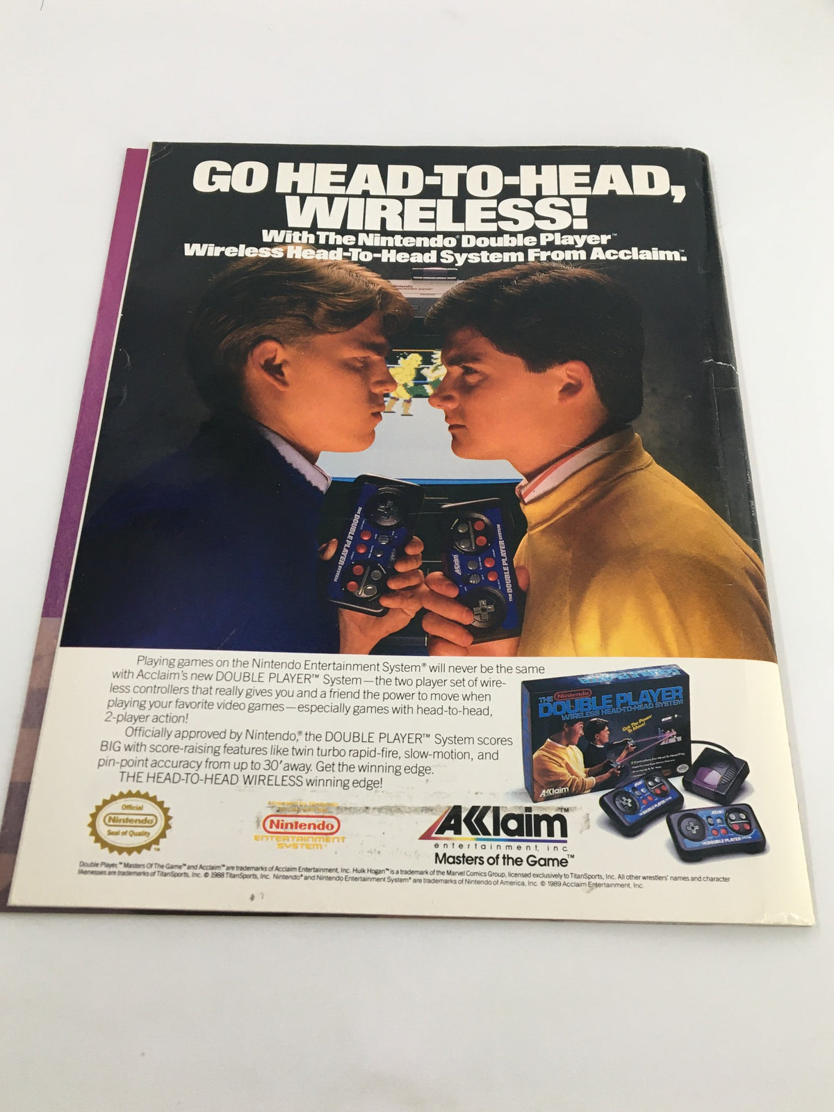 Vintage WWF Magazine December 1989 advertising the Nintendo Double Player video game system, featuring two boys engaged in wireless gameplay.