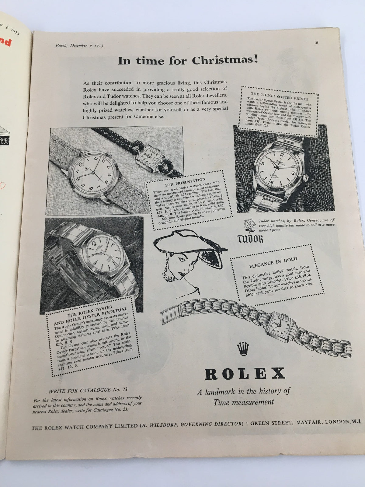 Interior page of the Vintage Punch magazine from December 9, 1953, featuring an advertisement for Rolex watches, demonstrating vintage advertising style and design.