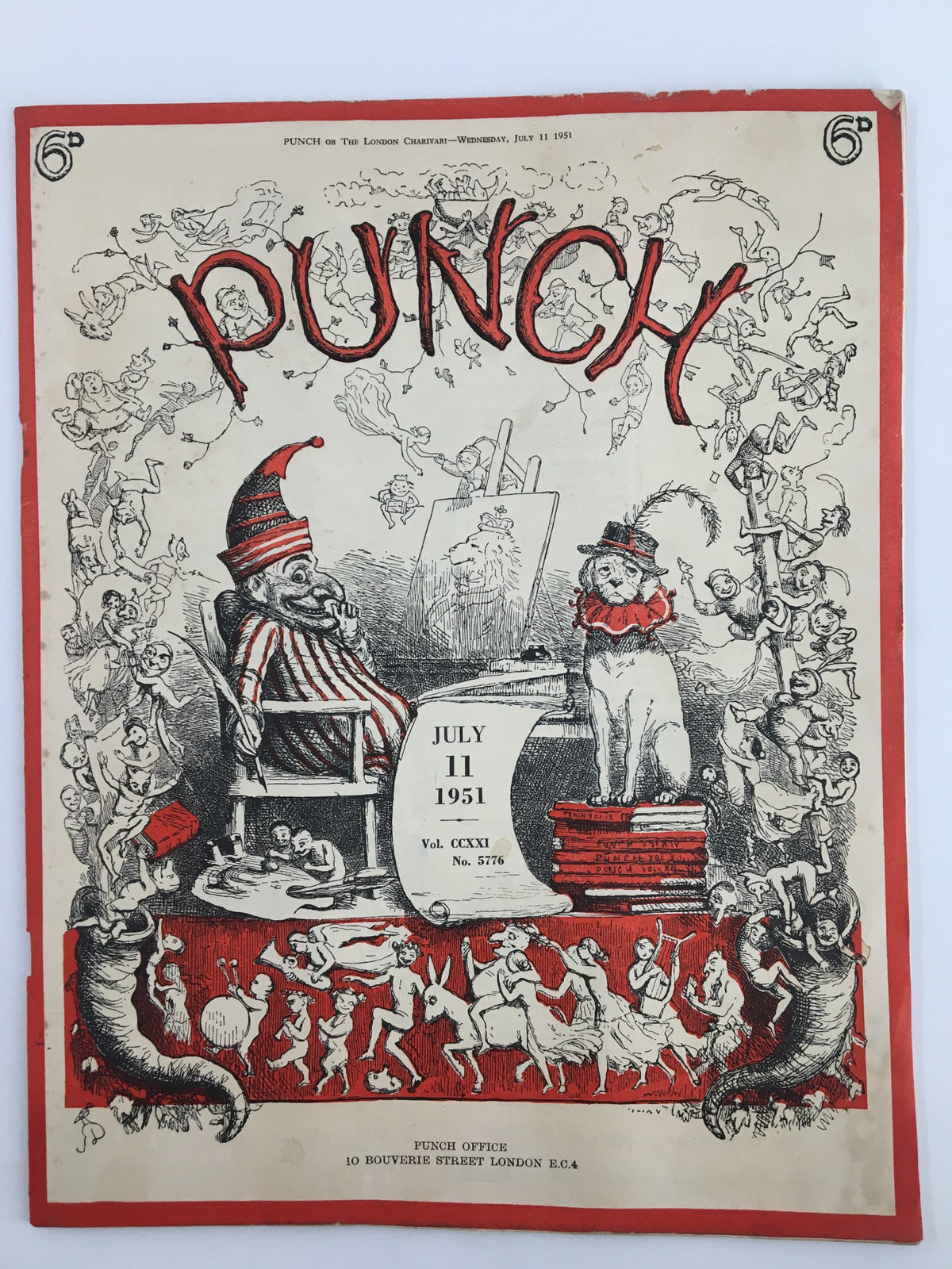 Cover of the VTG Punch magazine from July 11, 1951, featuring whimsical illustrations, a clown, a cat, and various humorous figures. This WWII Cartoon & Humour Magazine captures the essence of post-war Britain with its witty artwork and social commentary.