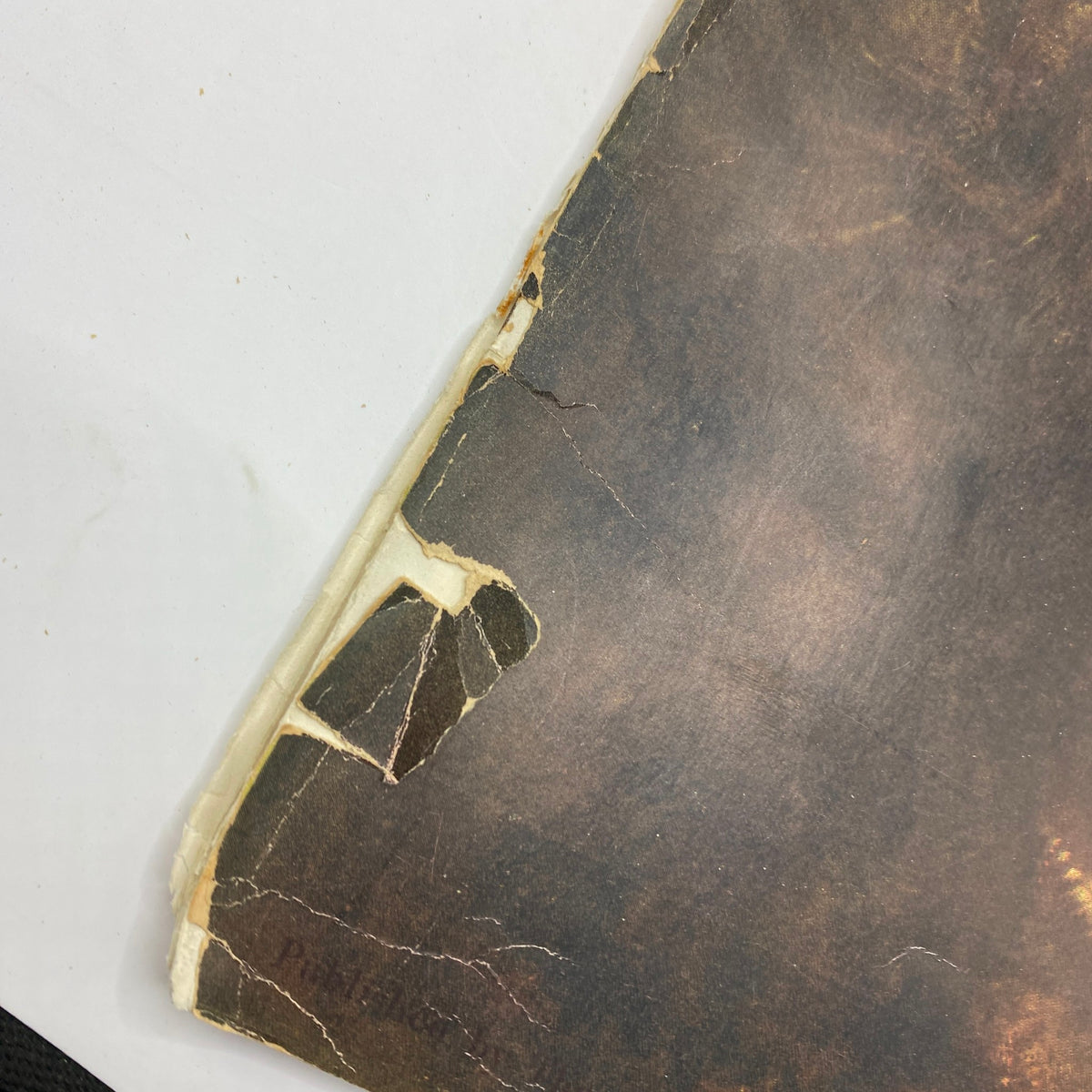 Close-up view of the spine and cover edge of the VTG Art News Magazine, February 1, 1942, with visible wear and tear, reflecting its vintage condition. The issue highlights the special Rembrandt feature.