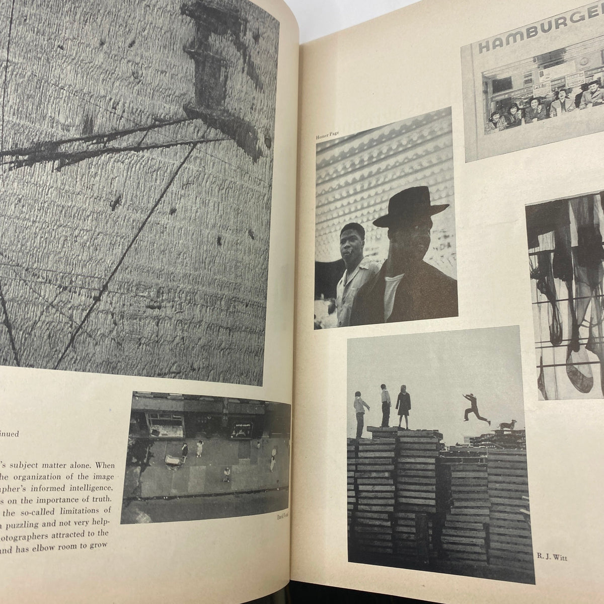 VTG Art News Magazine September 1950 featuring images of photographers and artistic works including urban landscapes and people observing art.