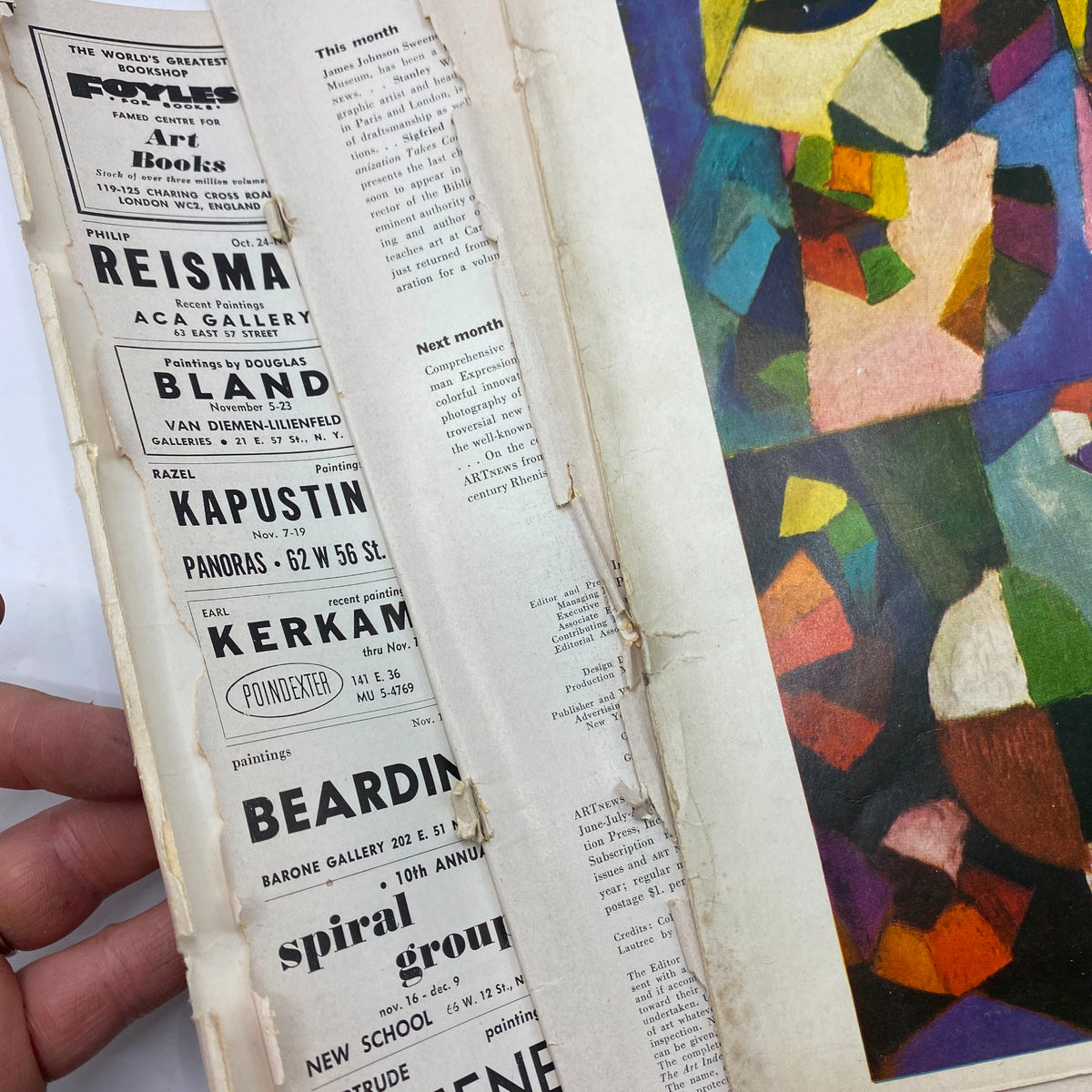 Inside view of Art News Magazine, November 1955, showing advertisements and announcements, reflecting the artistic community of the era.