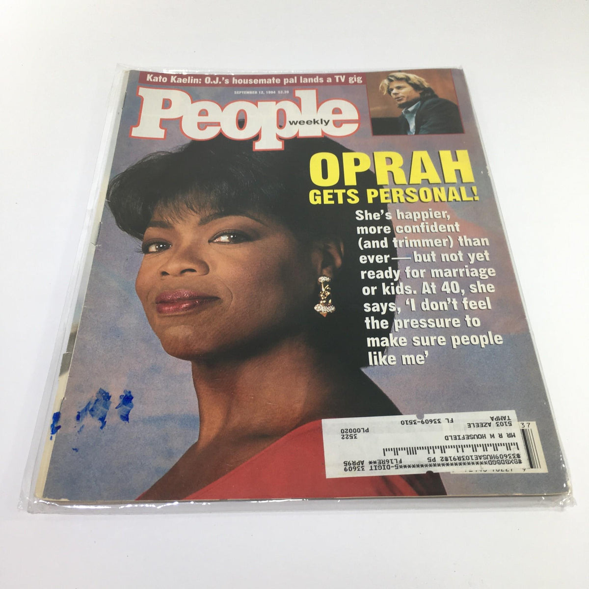 Cover of People Magazine from September 12, 1994, featuring Oprah Winfrey with the headline 'OPRAH GETS PERSONAL!'. The image captures Oprah smiling confidently, showcasing her signature style with visible accessories.