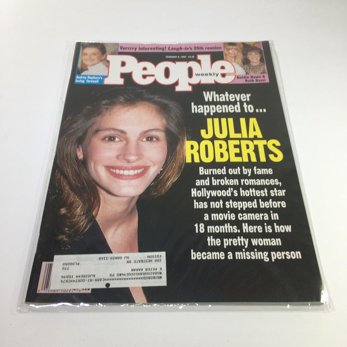 Cover of People Magazine February 8, 1993 featuring Julia Roberts, with the headline discussing her experiences with fame and romance. The magazine captures her smiling portrait and reflects on her absence from the film industry.