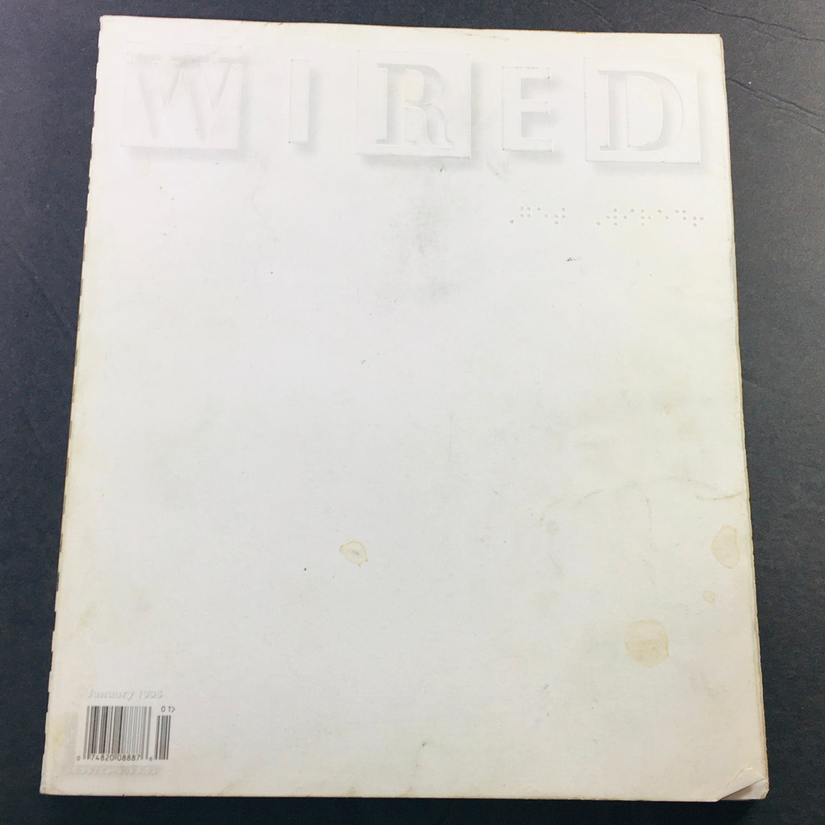Back cover of Wired Magazine January 1995 Vol 3 #1 featuring an all-white minimalist design with a subtle logo.
