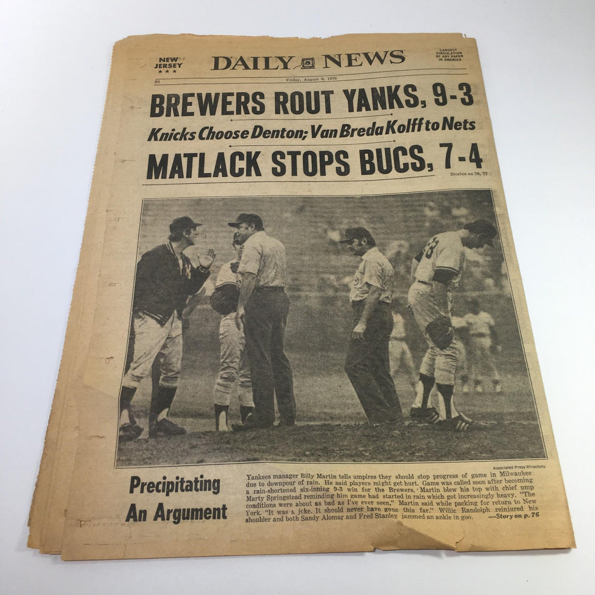 NJ Daily News front page from August 6, 1976, with the headline 'Brewers Rout Yanks, 9-3' discussing a baseball game, including details about players and teams involved.