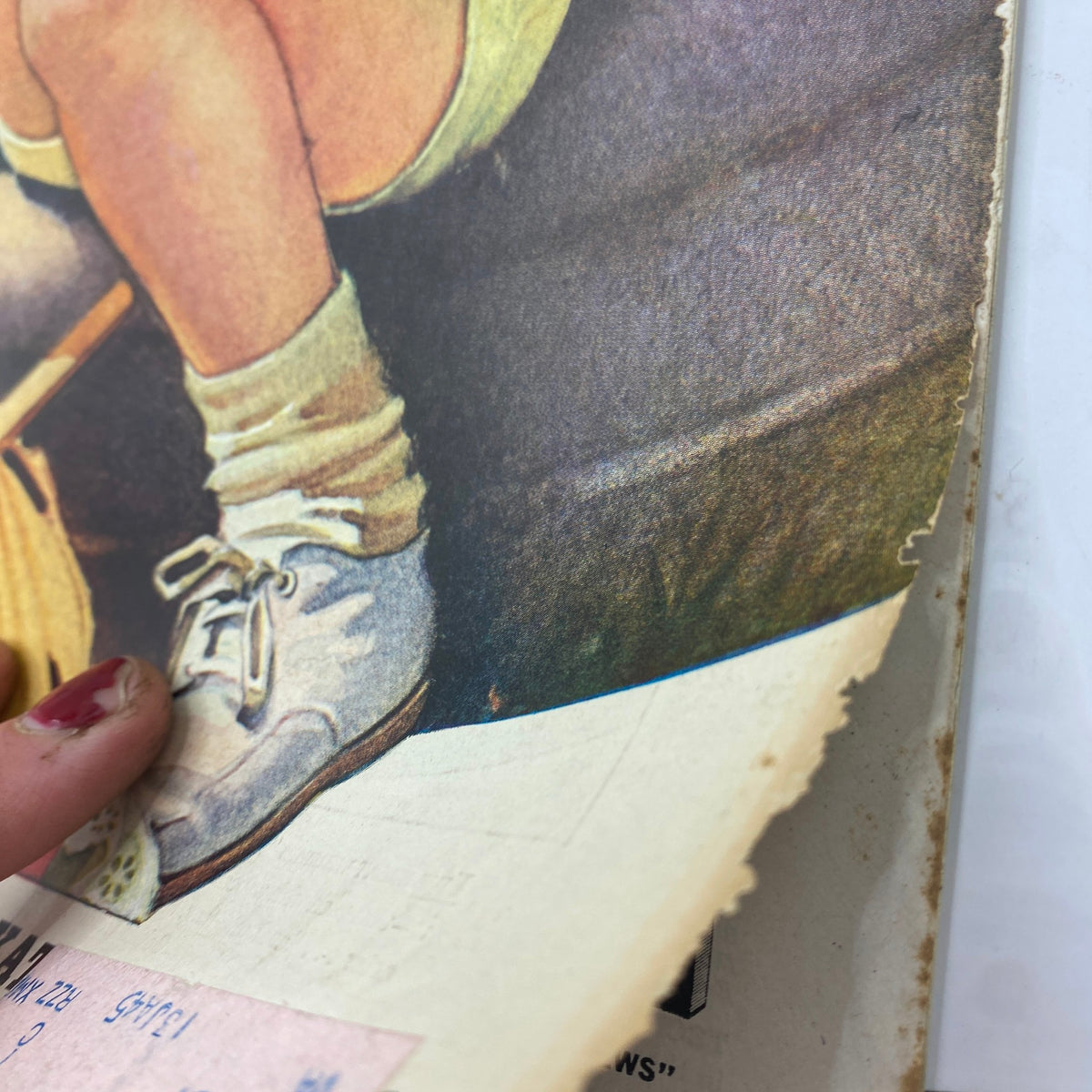 Close-up of the edge of the vintage 'Collier's Magazine' August 7, 1943, with a focus on the illustration by Frances Tipton Hunter and visible wear indicating its historical significance.