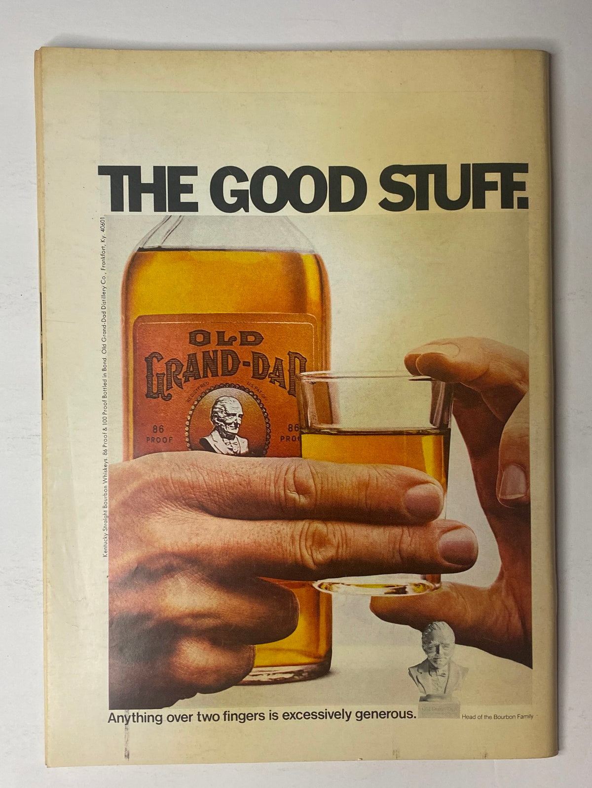Advert for Old Grand-Dad whiskey from The New Yorker magazine, featuring a hand holding a glass and the slogan 'THE GOOD STUFF', dated February 20, 1971.