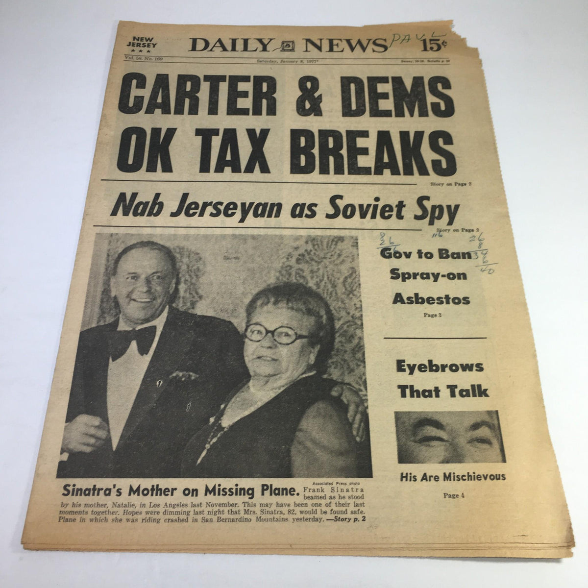 NY Daily News newspaper from January 8, 1977 featuring the headline 'Carter & Dems OK Tax Breaks Nab Jerseyan as Soviet Spy'. The image shows a photo of a man and woman, with a vintage design characteristic of 1970s newspapers.
