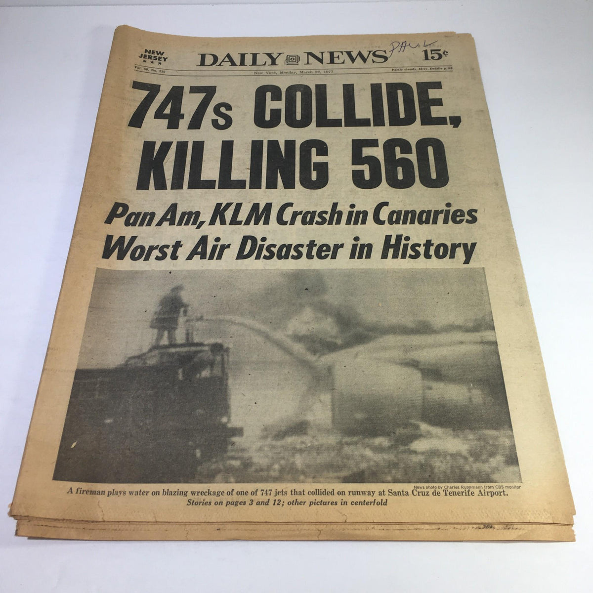 NY Daily News:3/28/77 747s Collide, Killing 560; Fireman Plays Water On Wreckage
