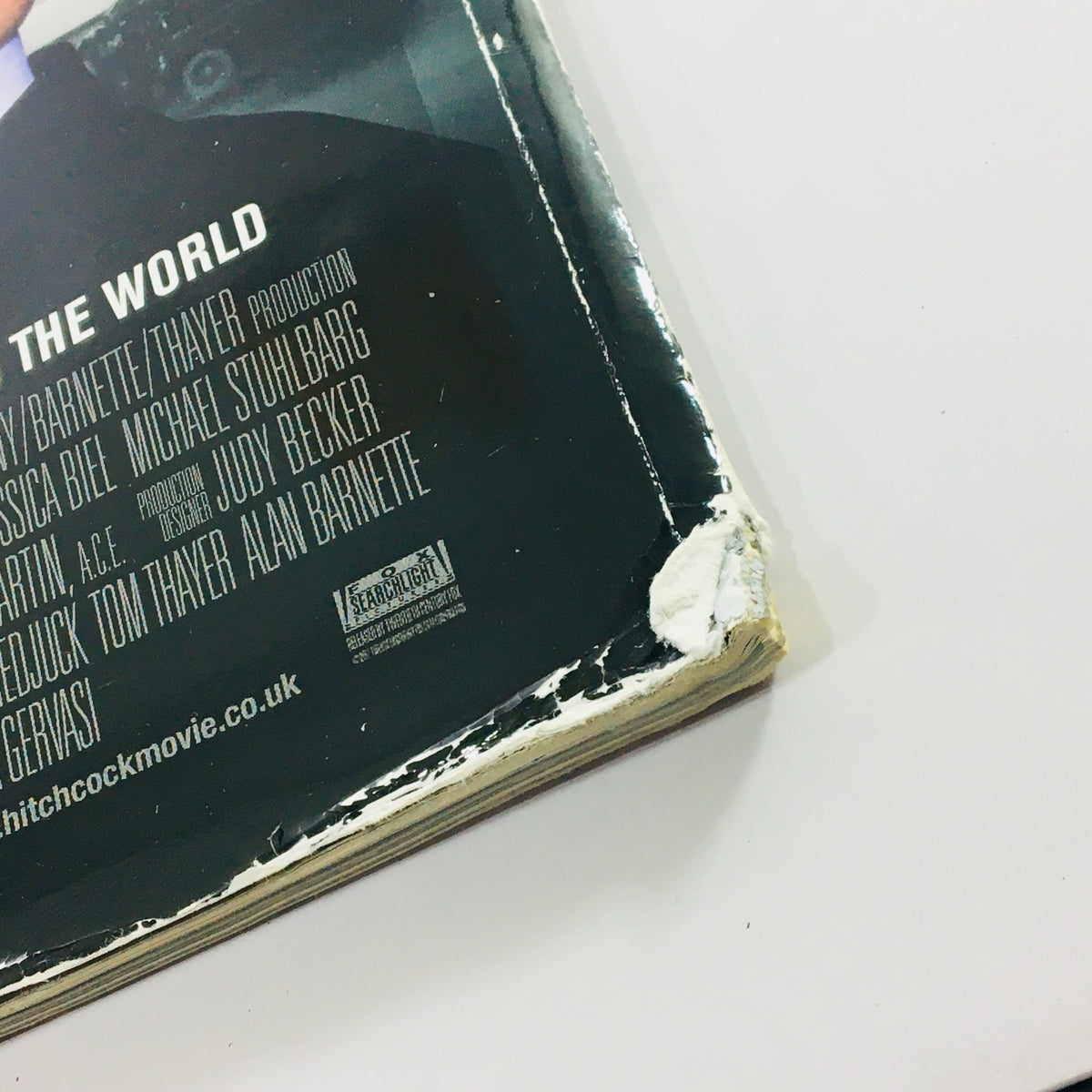 Side view of Total Film Magazine February 2013 #202 showing signs of wear and tear, with a damaged corner on the back cover.