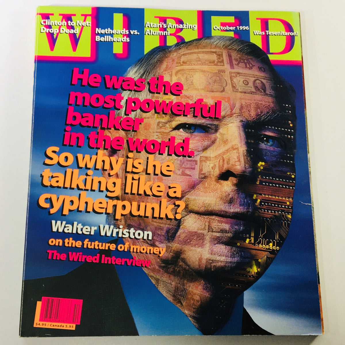 Wired Magazine October 1996 Vol 4 #10 featuring a cover image of Walter Wilson, labeled as the 'Most Powerful Banker,' with vibrant text discussing his views on cypherpunks and the future of money.