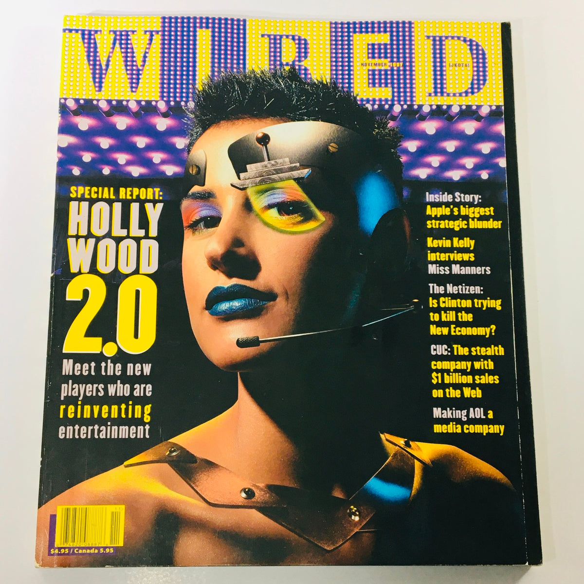 Cover of Wired Magazine from November 1997, Vol 5, #11 featuring the title 'Hollywood 2.0' and an eye-catching image of a futuristic figure with colorful makeup, reflecting themes of technology and entertainment.