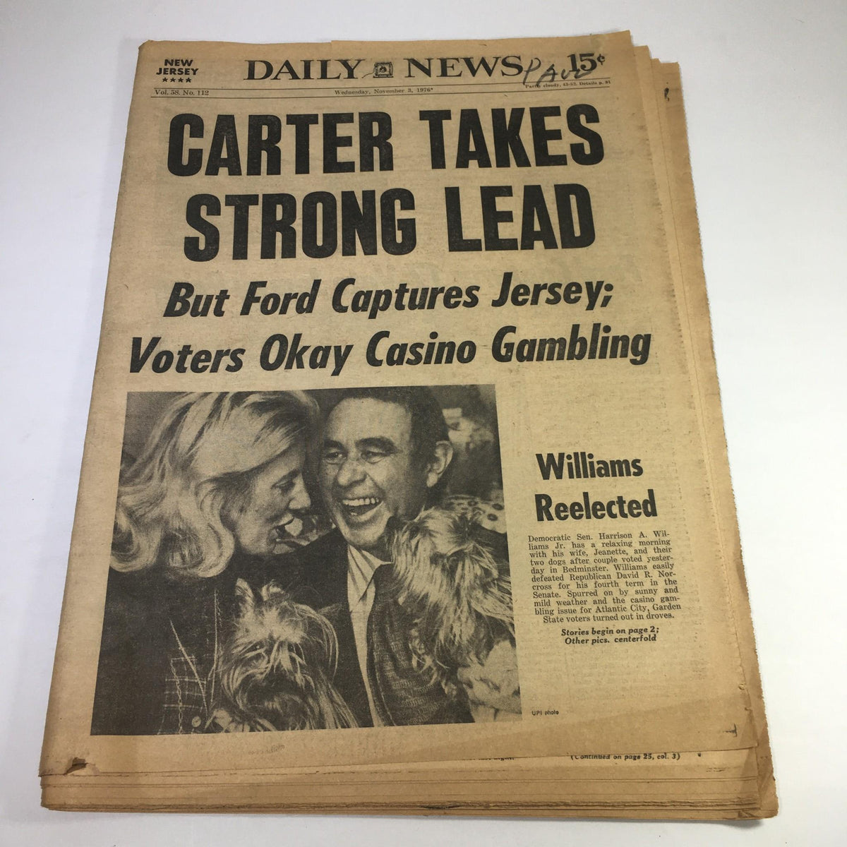 NY Daily News headline from November 3, 1976, featuring 'Carter Takes Strong Lead; But Ford Captures Jersey; Voters Okay Casino Gambling; Williams Reelected', showcasing a historic political moment in American history.
