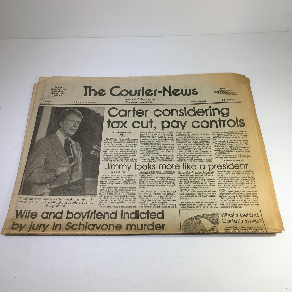 The Courier News: Nov 5 1976 featuring an article about Jimmy Carter considering tax cut and pay controls, with a photo of Carter giving a speech.