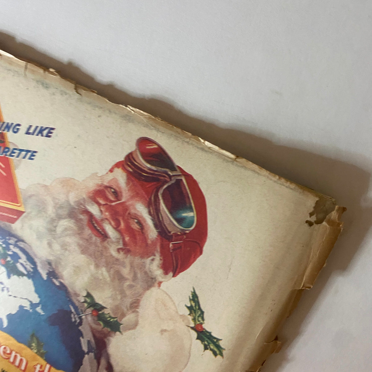 Close-up of the back cover of VTG Collier's Magazine December 18, 1943 showing Santa Claus and holiday-themed advertisement for Chesterfield cigarettes.