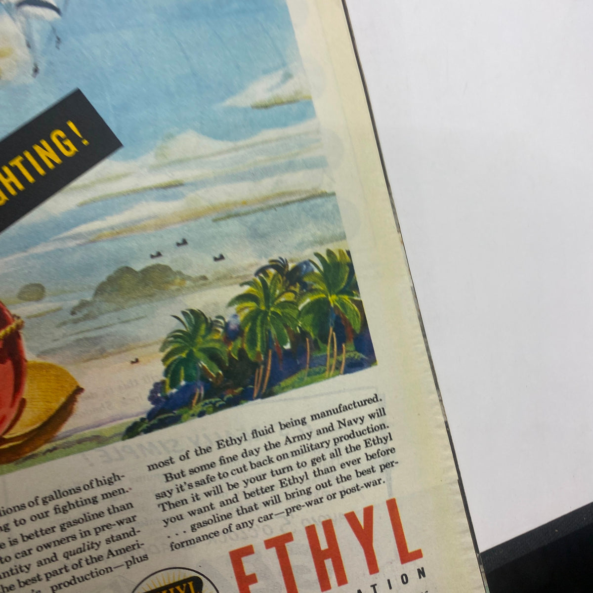 Vintage advertisement from Collier's Magazine February 10, 1945 featuring scenic imagery of palm trees and a beach along with a message about Ethyl fluid, highlighting the wartime production of gasoline.