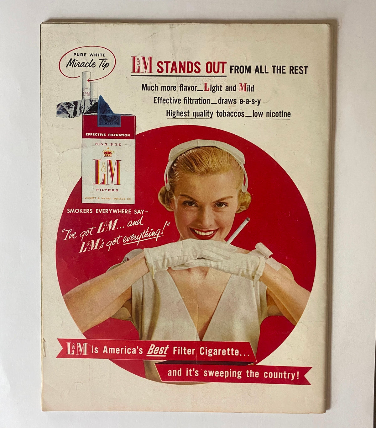 Back cover advertisement of VTG Life Magazine August 8, 1955 promoting L&M cigarettes with a stylish woman, reflecting mid-20th century advertising trends.