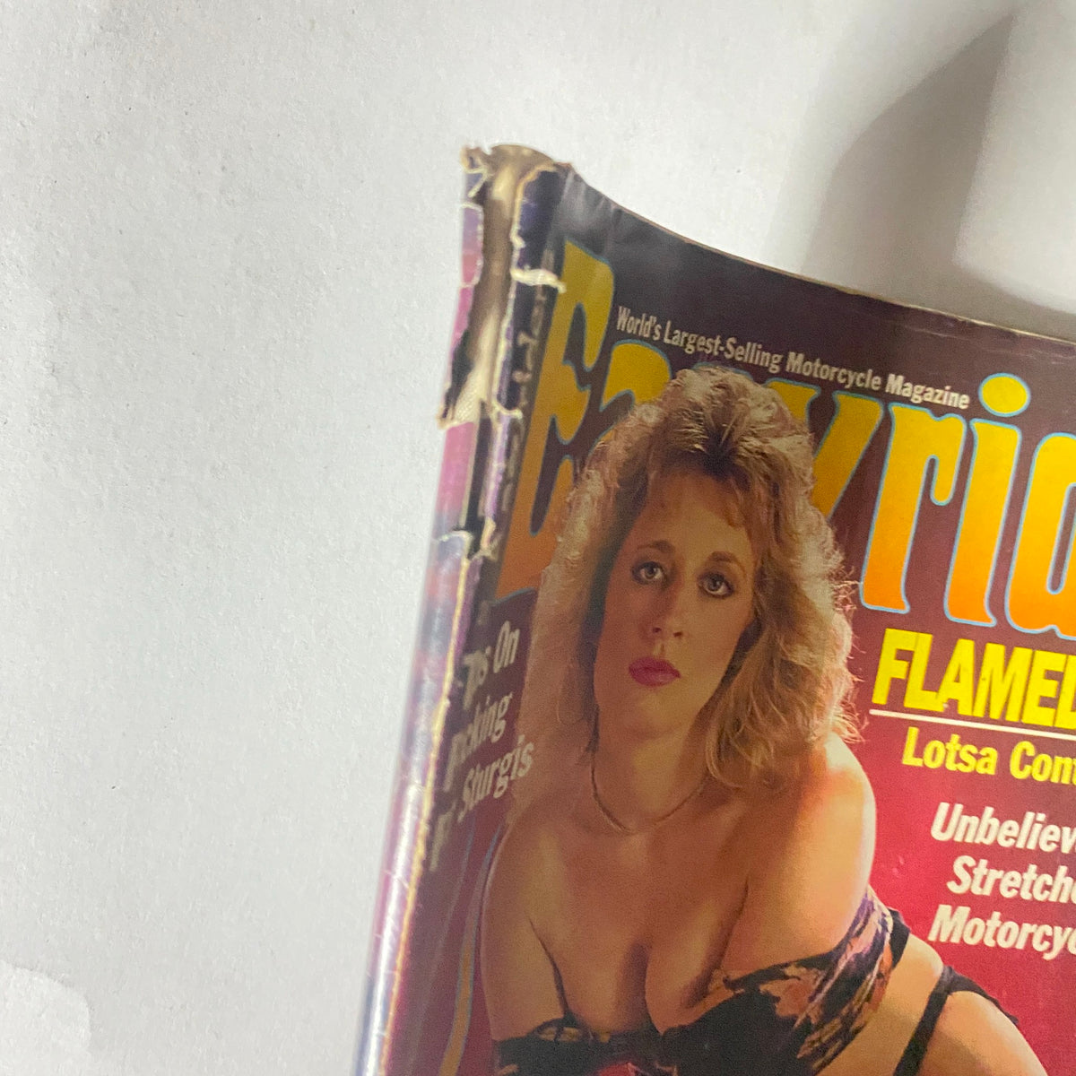 Close-up of Easyriders Magazine August 1990 cover, focusing on the main image of a woman and motorcycle, emphasizing the Flamed Special edition.