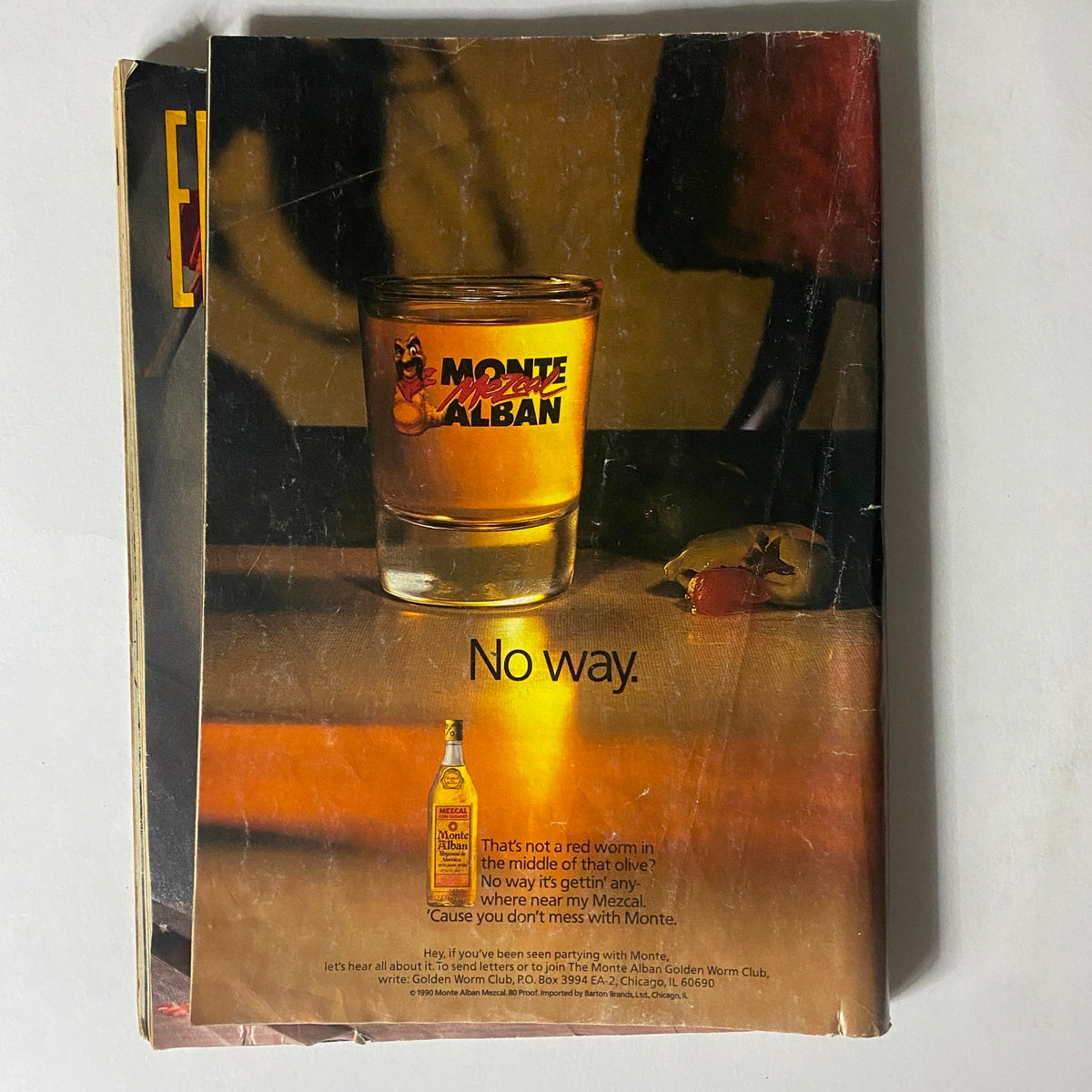 Back cover of Easyriders Magazine March 1991 featuring an advertisement for Monte Alban, with a shot of a glass.