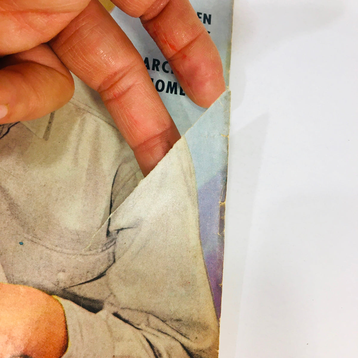 Close-up image showing the corner damage of the November 1959 VTG Movieland and TV Time magazine cover, showcasing vintage magazine wear.