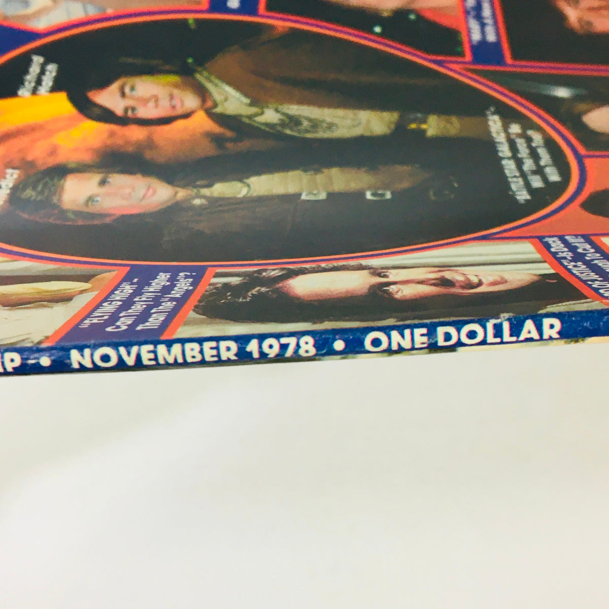 Close-up view of the spine of VTG Ronna Barrett's Gossip Magazine November 1978, showcasing publication details and minor wear, ideal for collectors.