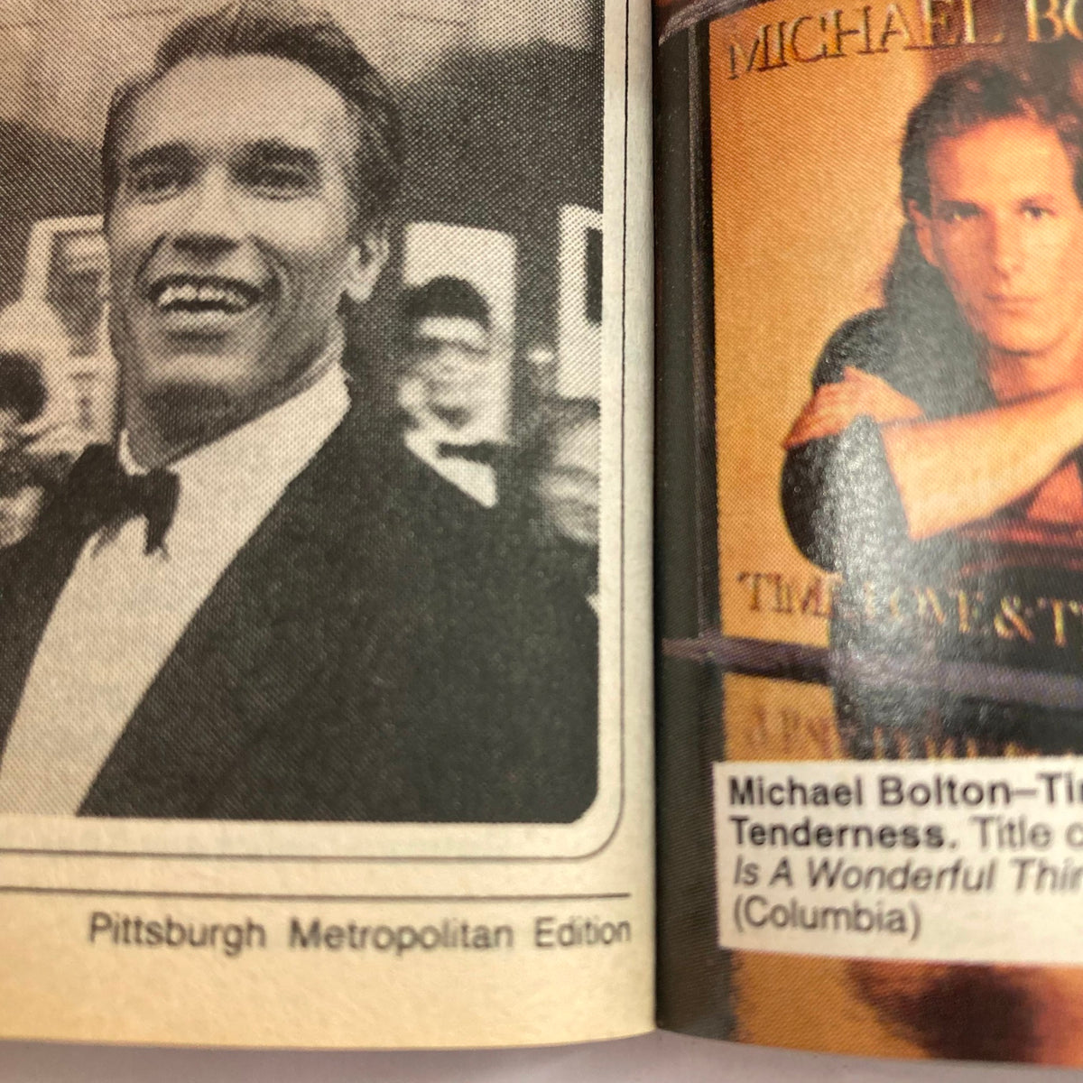 Inside page of TV Guide Magazine July 27 1991 featuring Arnold Schwarzenegger, accompanied by a mention of Michael Bolton's album 'Time, Love & Tenderness' in the Pittsburgh Metropolitan Edition.