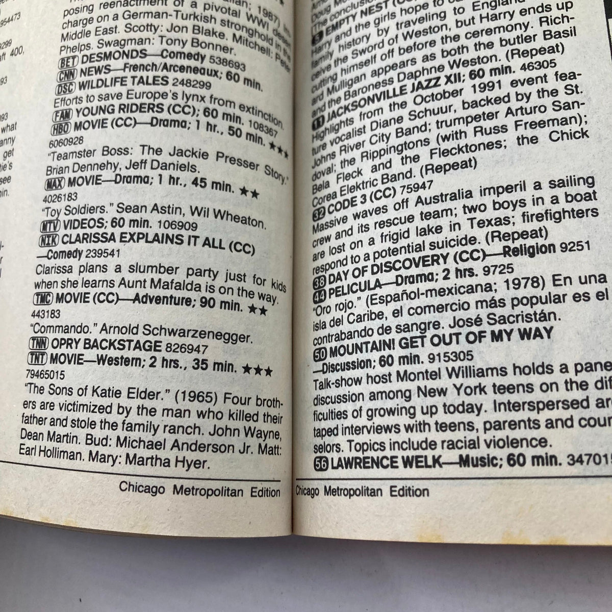 Inside spread of TV Guide Magazine September 12, 1992, showcasing programming listings and descriptions from the Chicago Metropolitan Edition.
