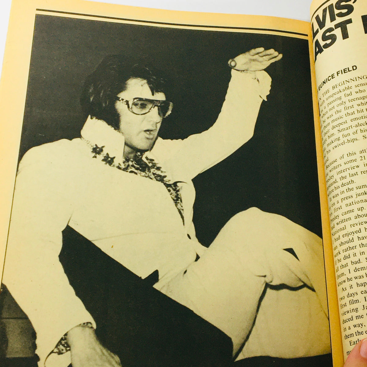 VTG 1977 Elvis Aron Presley A Photoplay Tribute Special Collector's Edition capturing Elvis Presley in a dynamic pose, highlighting his iconic stage presence.
