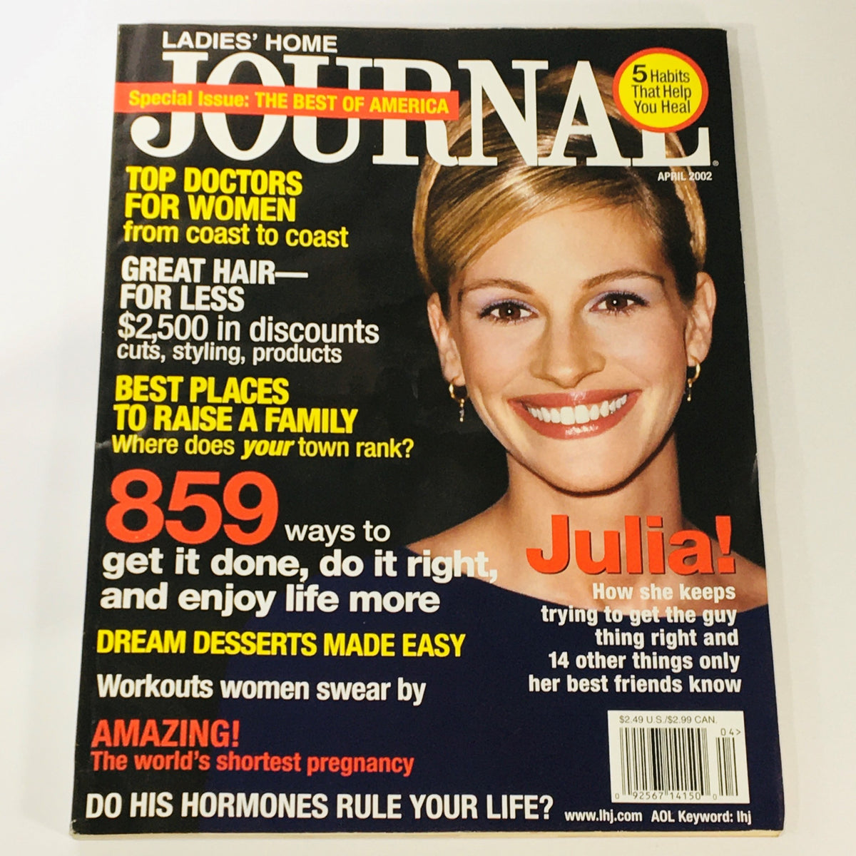 Ladies' Home Journal Magazine April 2002 featuring Julia Roberts on the cover, showcasing recipes for dream desserts and topics of wellness, health, and family.