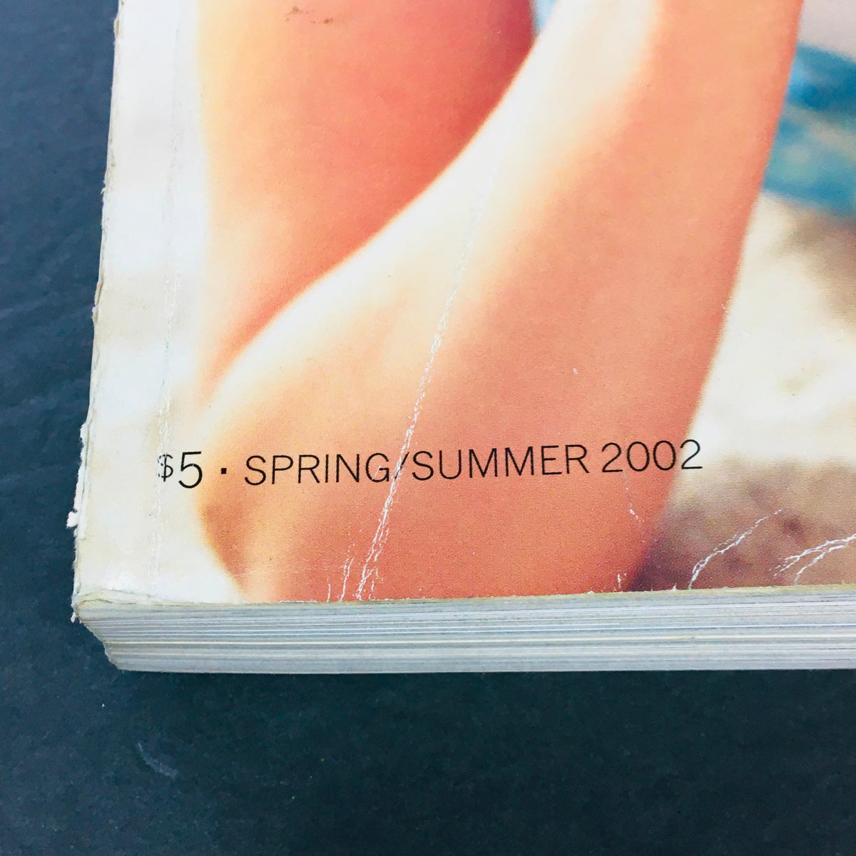 Side view of the JC Penney Spring Summer 2002 Store Catalog showcasing the price tag and season details; valuable piece of retail history reflecting early 2000s fashion.